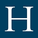 Axiom Healthcare Group logo