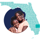 Caridad Corporation logo