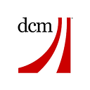 DCM Group logo