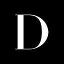 Divine.Ca logo
