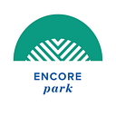 Encore Park Dallas logo