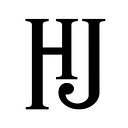 Happy Jewelers logo