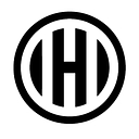 Hogan Associates Real Estate logo