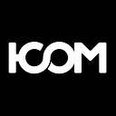 I Com logo