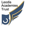 Woodkirk Academy logo