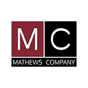 Mathews Company (M C) logo