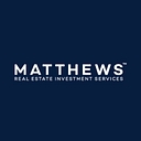 Matthews Real Estate Investment Services™ logo