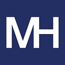 Mike Hostilo Law Firm logo