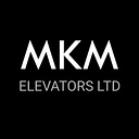 M K M Elevators logo