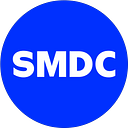 Logo de SMDC