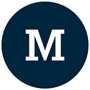 Logo de The Moment Group