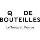 Q de bouteilles logo