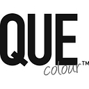 Que Colour logo