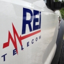 REI Telecom logo