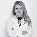 Russak Dermatology Clinic logo