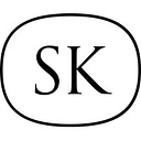 Satomi Kawakita Jewelry logo