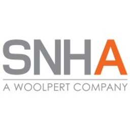 SNHA - A Woolpert Company logo