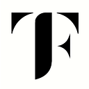 The First Collection logo