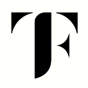 The First Collection logo