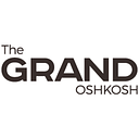 The Grand Oshkosh Inc logo