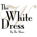 The White Dress By The Shore logo