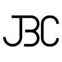 The John Buck Company logo