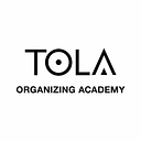 TOLA Organizing Academy logo