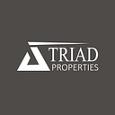 Triad Properties Corporation logo