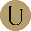 Uptown Salon logo