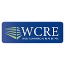 Wolf Commercial Real Estate (Wcre) logo