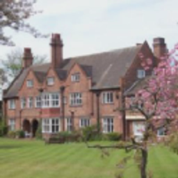 Woodlands Quaker Home logo