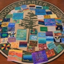 The Woods Charter School logo