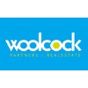 Woolcock Partners Real Estate logo